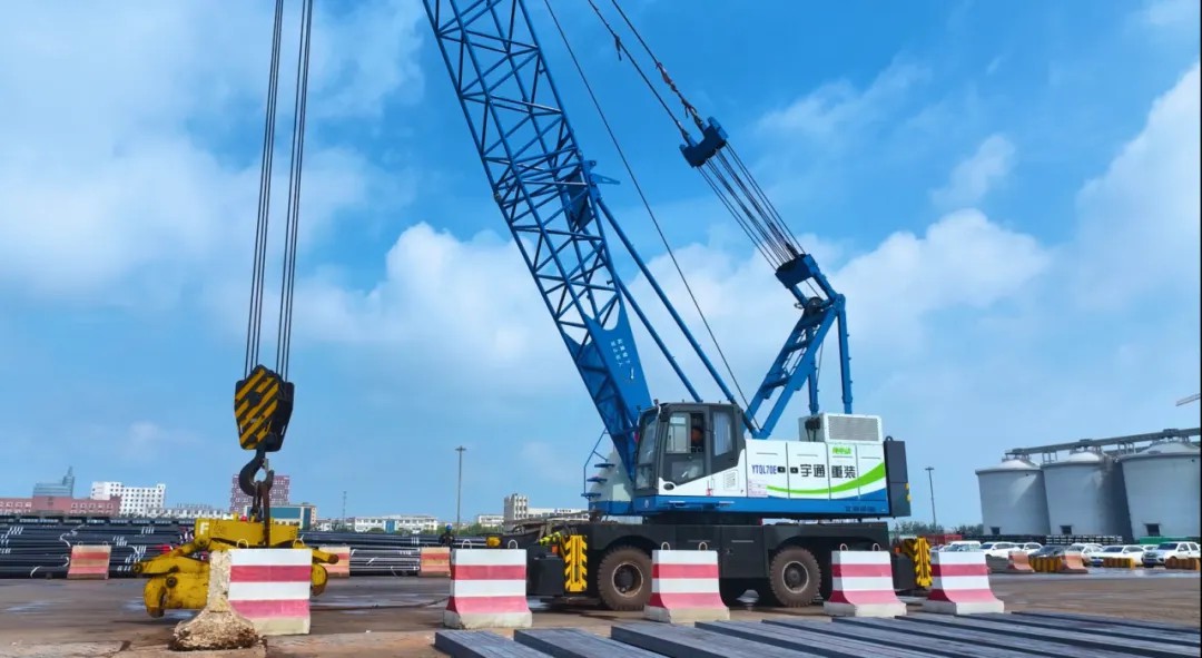 pg电子纯电动口岸轮胎起重机：以硬核三电手艺，，护航口岸绿色高效作业